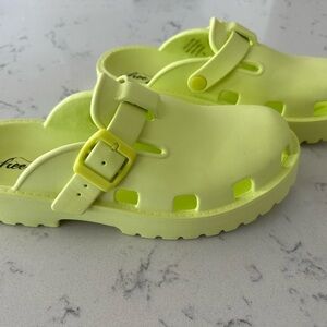 Neon Yellow-Green Slip-On Clogs with Adjustable Strap and Breathable Design